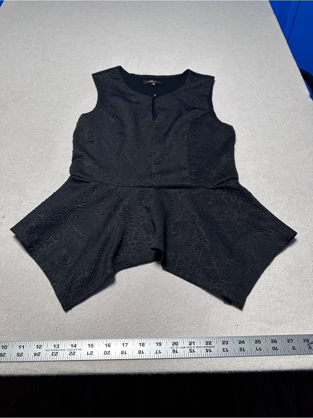 Monteau Black Sleeveless Peplum Top with Textured Pattern